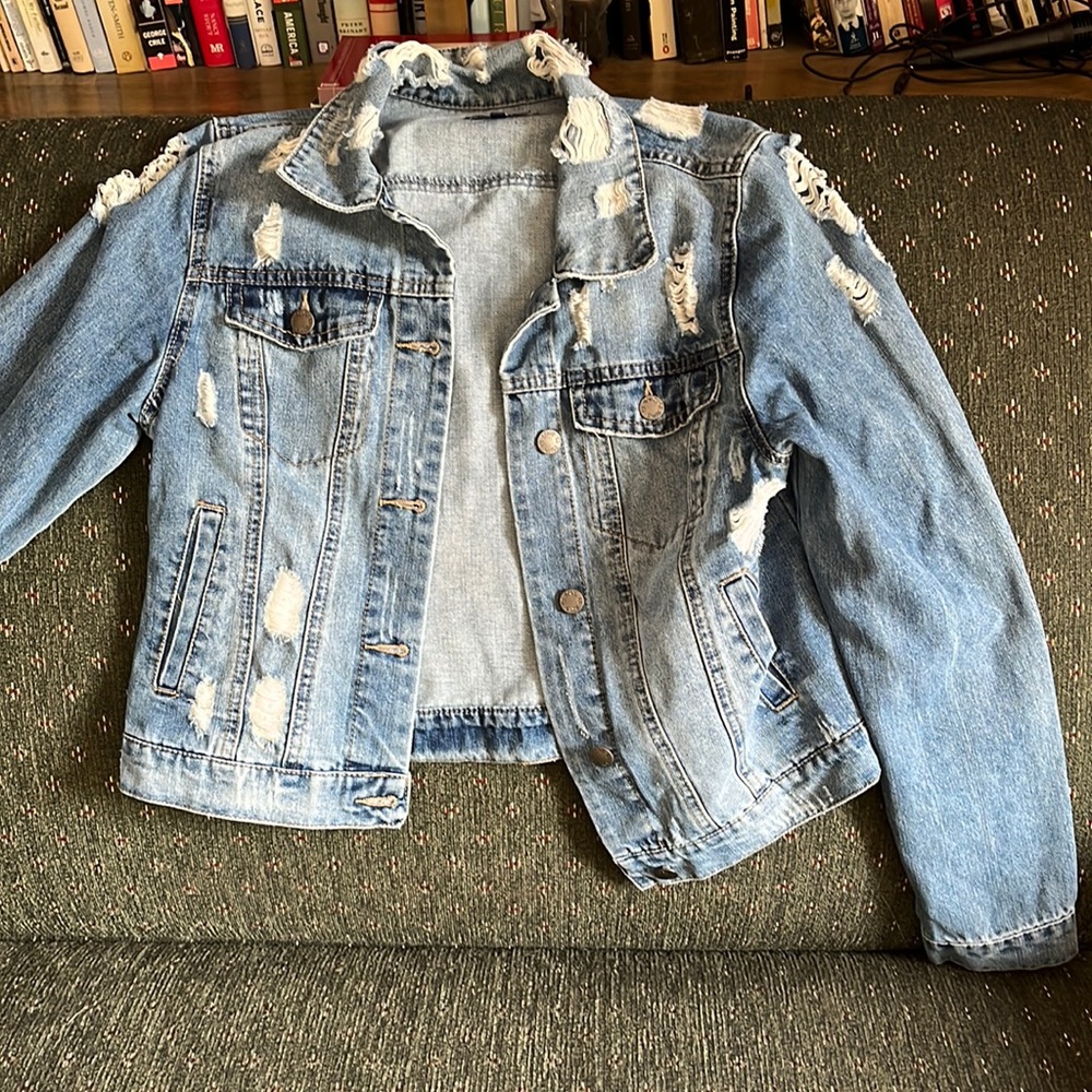 Stressed denim jacket, says XL but looks smaller